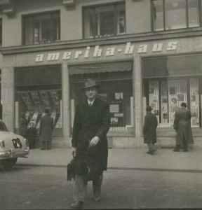 Dr. Frey exiting an Amerika Haus, likely in Austria.
