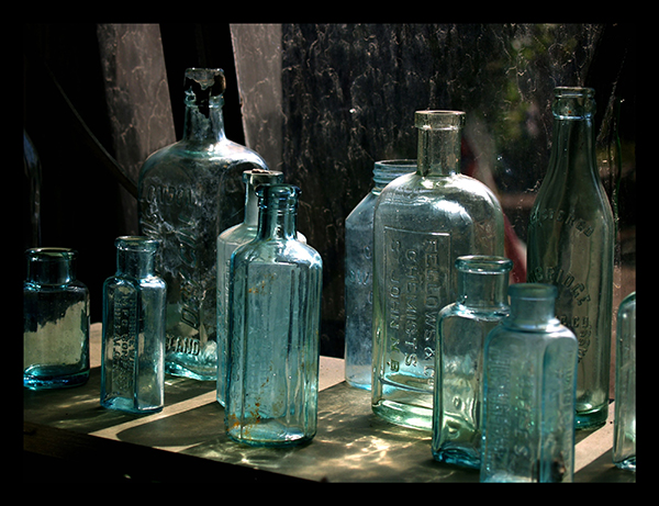 Assortment of antique bottles