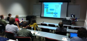  Image 3: Graduate students listen to Dean David W. Lewis's lecture on Open Access at Thursday's brown bag event