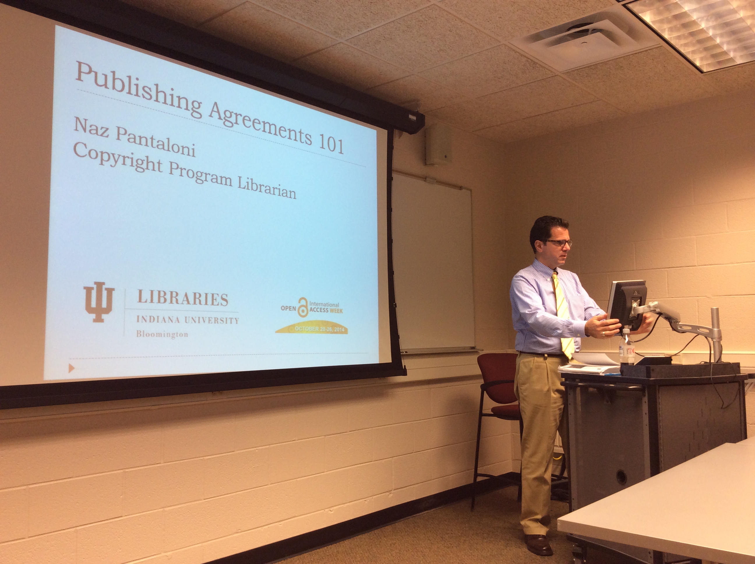 Naz Pantaloni gears up for his presentation on journal publishing agreements.