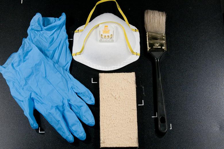  Nitrile gloves, N95 respirator, soot sponge, and brush