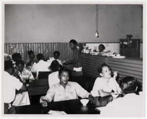 Students taking a break in the cafeteria at the National Institute of Administration.