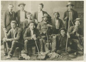Cavers, 1890 ((Front Row, L to R) Walter S. Chambers; Howard J. Hall; Raymond C. Morgan is seated behind Hall and has a rifle barrel next to his head; Professor of Romance Languages and Philology Gustaf Karsten; Russell Ratliff with arm on Karsten's leg; and Mark P. Helm. (Back Row, L to R) Walker (this is probably Orie Walker); Samuel M. Knoop; William Alonzo Marlow, Theodore Dreiser (seated), and Francis Elmer Kinsey) 