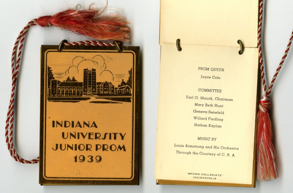 This dance card from May 5, 1939 has a metal casing and shows Louis Armstrong performed at the dance sponsored by The 1939 Junior Class of IU.