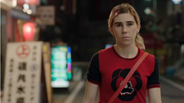 Color image from girls showing a young woman walking down the street with a blank look on her face.