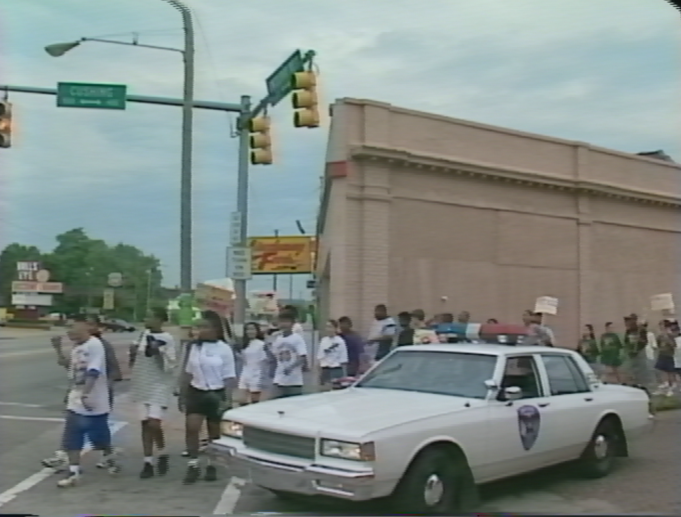 A screen grab of a WSJV segment on student demonstrations in South Bend, Indiana. July 26, 1995.