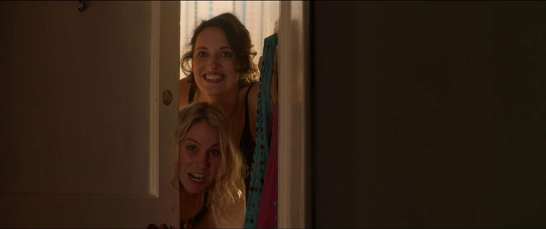 The image of two women smiling from the TV series, Fleabag