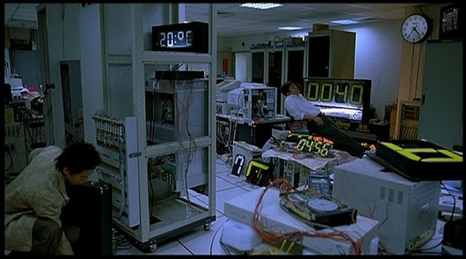 still image from the movie, What Time is it there?, shows an office full of computers