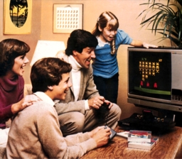 A family plays old computer game