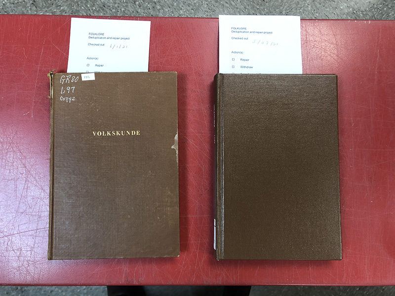 Two copies of the same book, closed