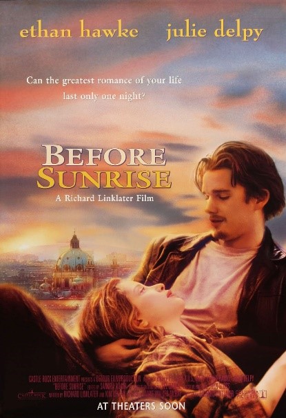DVD cover art for the film "Before Sunrise." A young man is pictured seated, looking down and slightly reclining. A woman has her head in his lap and looks up at him. Behind them one can see the city of Vienna, with pinkish clouds in the sky above.