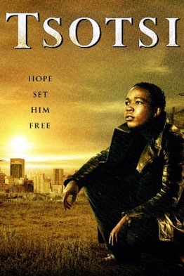 A young Black man with short hair and a black leather jacket sits crouched in the right half of the image, with his face in profile. Behind him is a cityscape bathed in the golden light of a sunset. At the top of the image is the film title, "Tsotsi," and below that the words "Hope set him free."