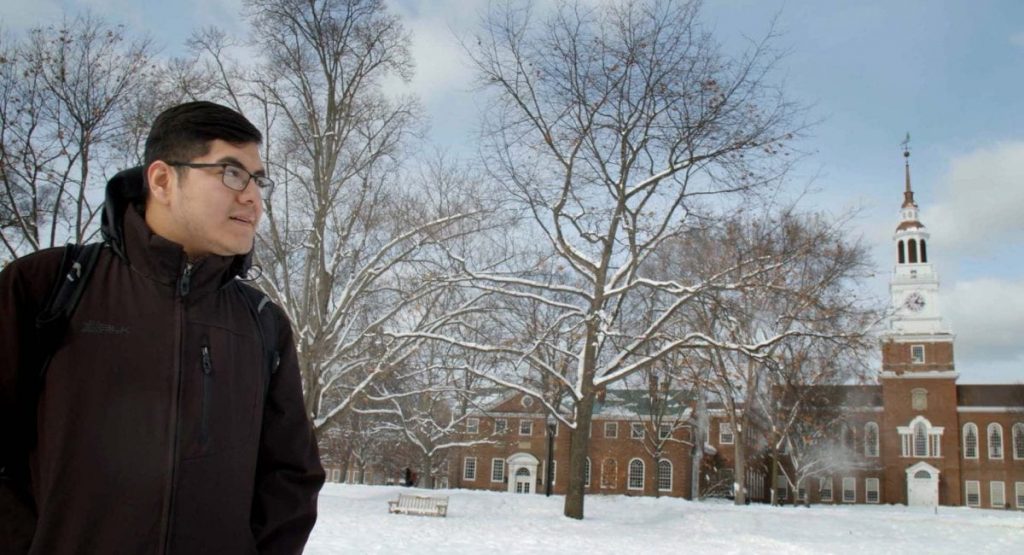 Producer Óscar Rubén Cornejo Cásares appears outdoors in winter on a snow-covered college campus in the film Change the Subject.