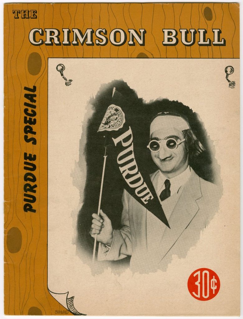 Cover of the November 1952 Purdue Spcial issue of the Crimson Bull which includes an illustration of a man in a suit wearing a mask and waving a Purdue pennant. 