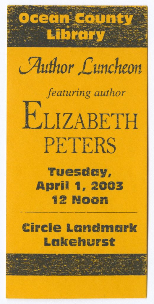 Small yellow stub with the following text in black: “Ocean County Library Author Luncheon featuring author Elizabeth Peters Tuesday, April 1, 2003 12 noon Circle Landmark Lakehurst”