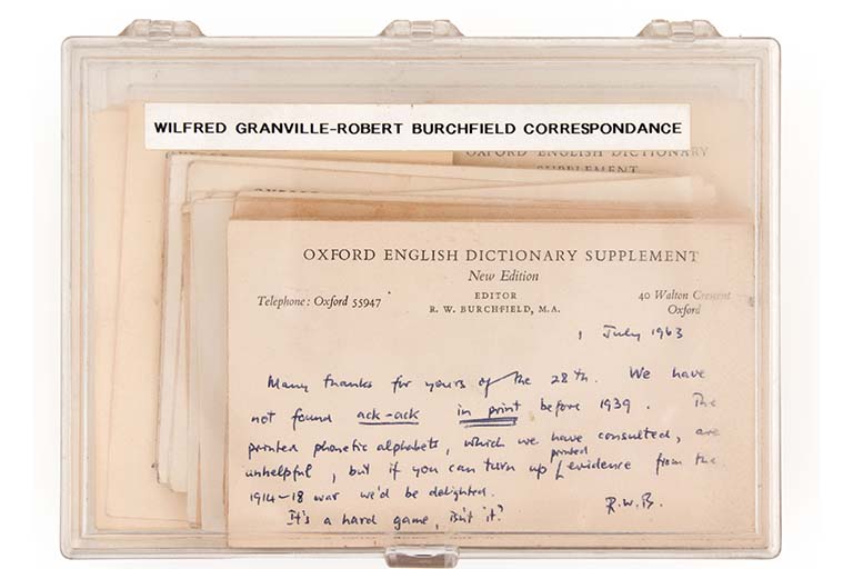 Plastic box holding postcards, labeled "Willfred Granville-Robert Burchfield Correspondance"