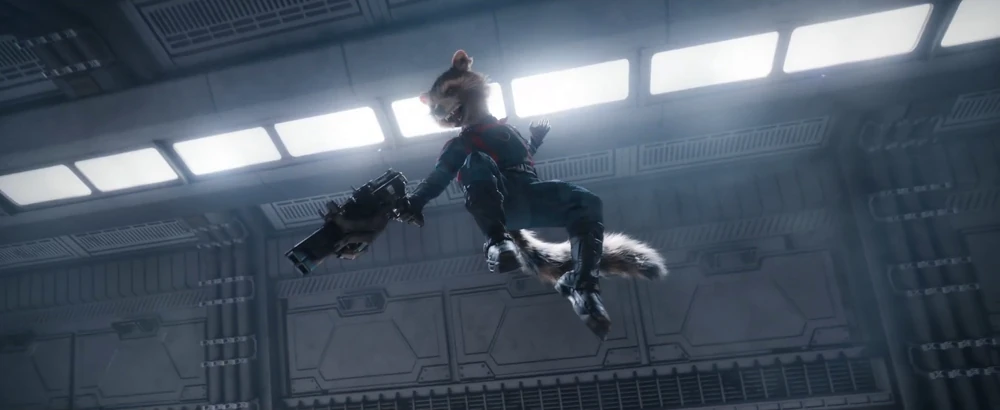 Four pictures from Guardians of the Galaxy. A raccoon holding a gun 