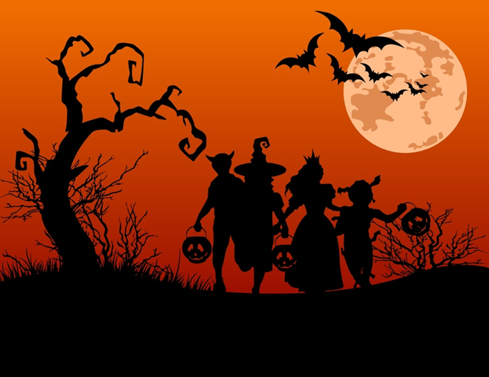 silhouette of trick or treaters